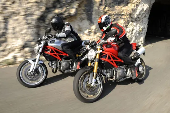 2009 Ducati Monster 1100 (silver) and Monster 1100S (red)