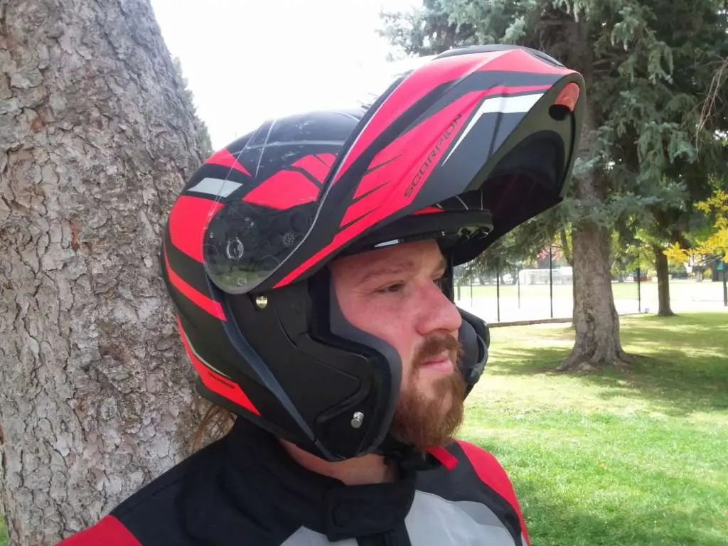 Flip-up helmet with raised chin bar