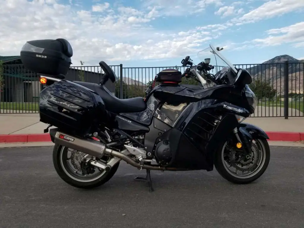 Kawasaki Concours 1400 pictured in profile with Scorpion RedPower exhaust pipe installed.