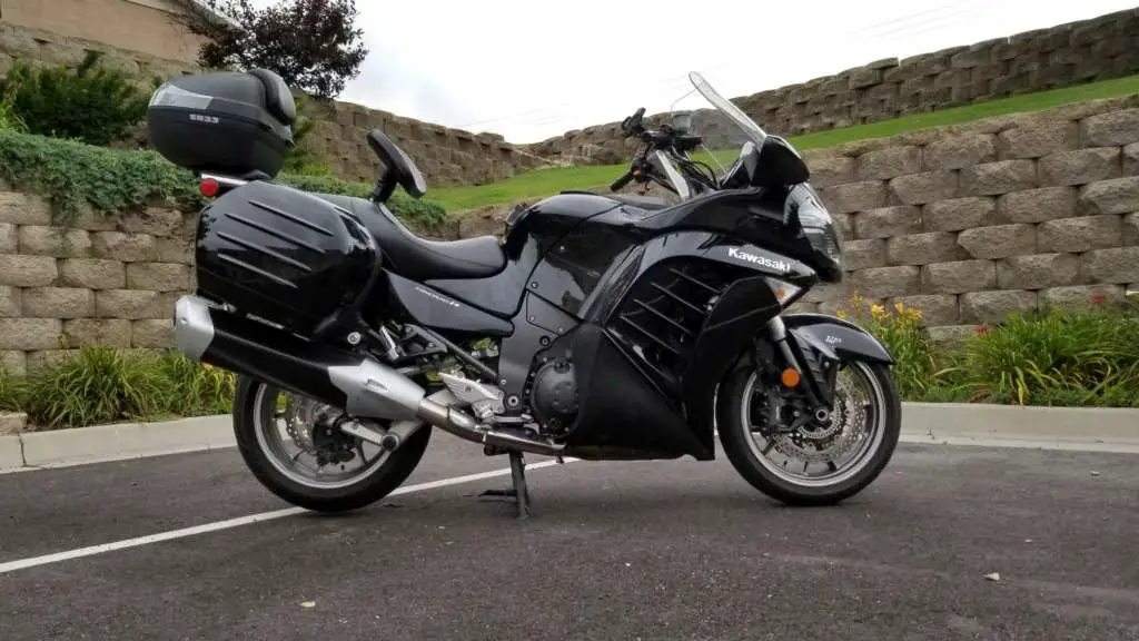 Kawasaki Concours 1400 pictured in profile with stock exhaust installed.