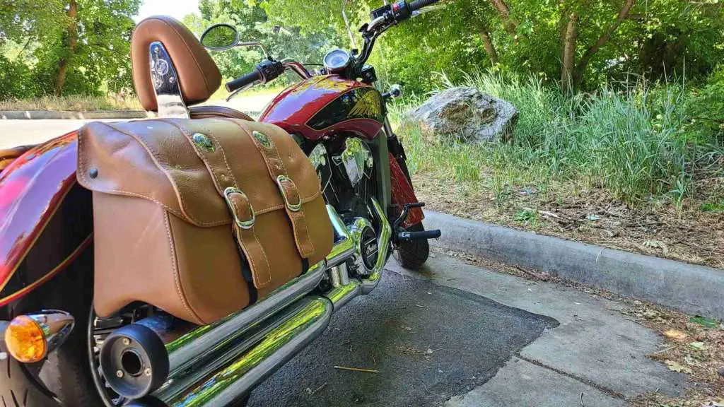 Right side of the 2019 Indian Scout, showcasing tank graphics and exhaust pipes.