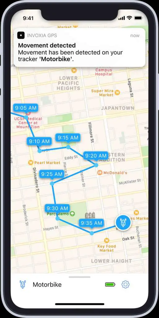 Map view of the Invoxia GPS app, showing multiple location tags in blue over a Google Maps image.