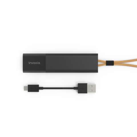 Pictured is the Invoxia GPS Tracker, a narrow black rectangle with a nylon lanyard at one end. Below the device is the included USB charging dongle.